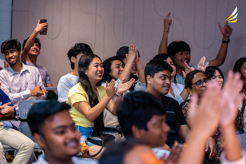 Students cheering during a live session at Spend a Day