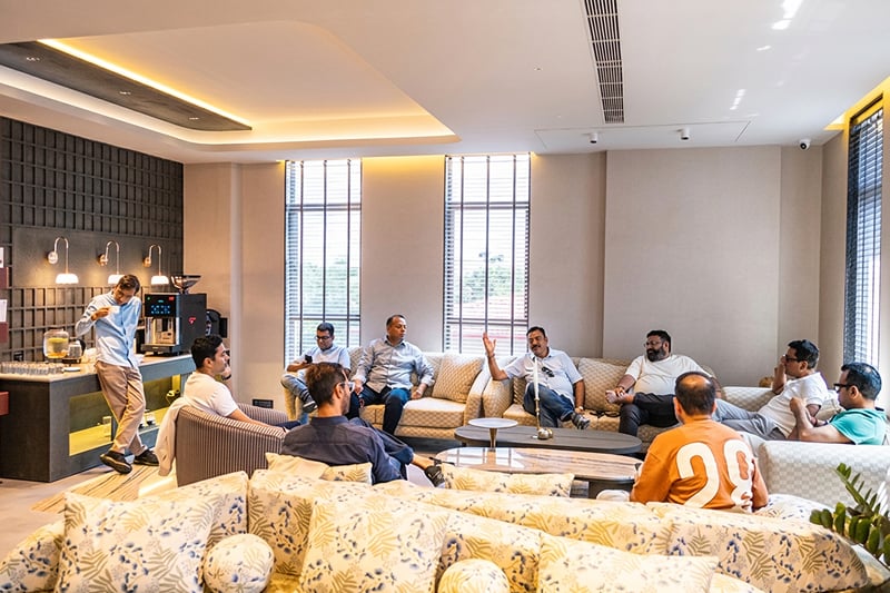 A small group of residents relaxing together in the Invana lounge
